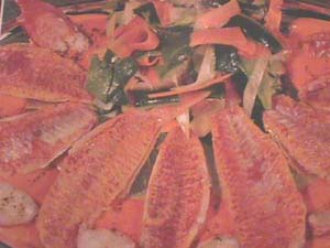 Red mullet with vegetable ribbons and piquillo pepper sauce